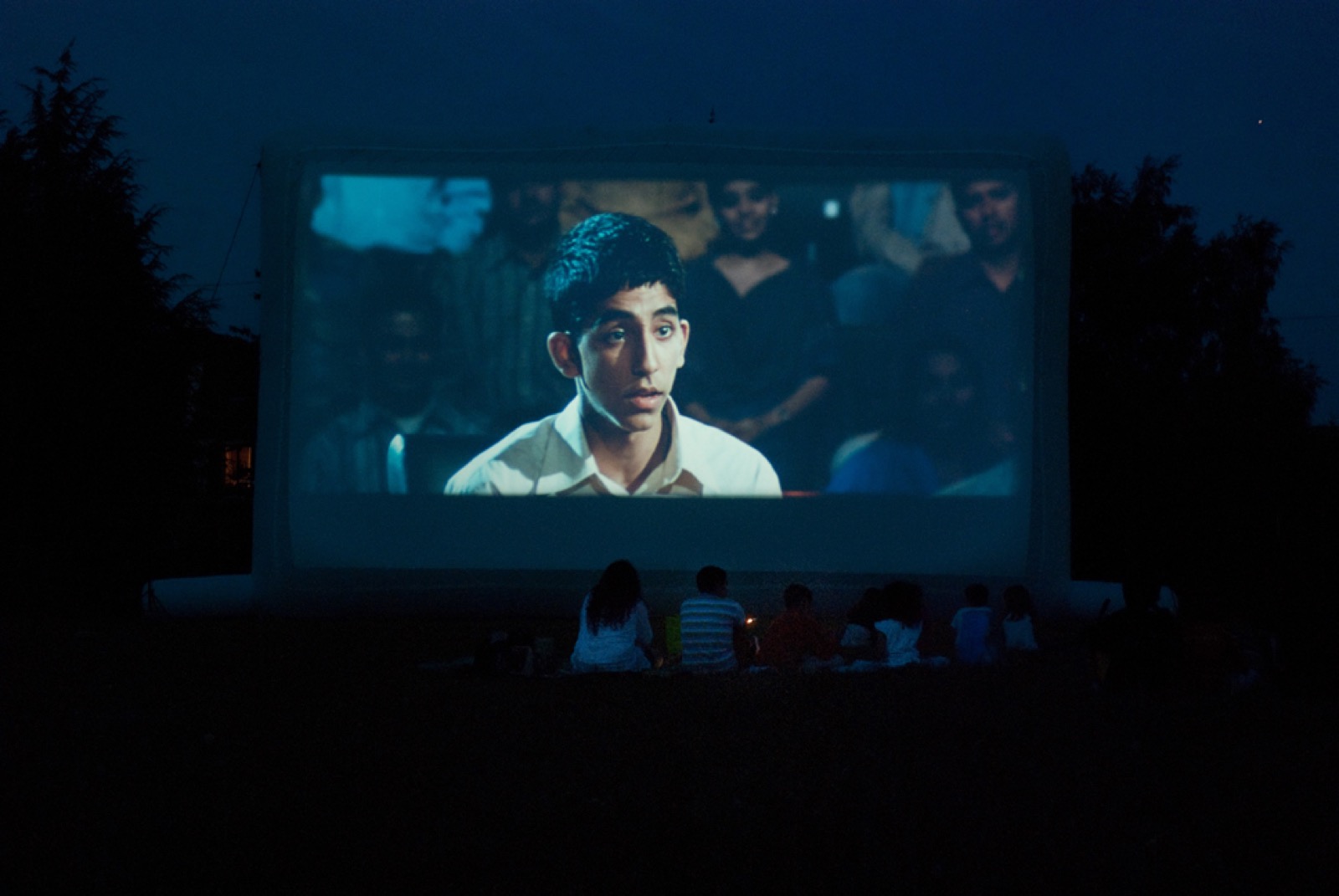 Open-air cinema screening on a giant inflatable screen at Hallucine